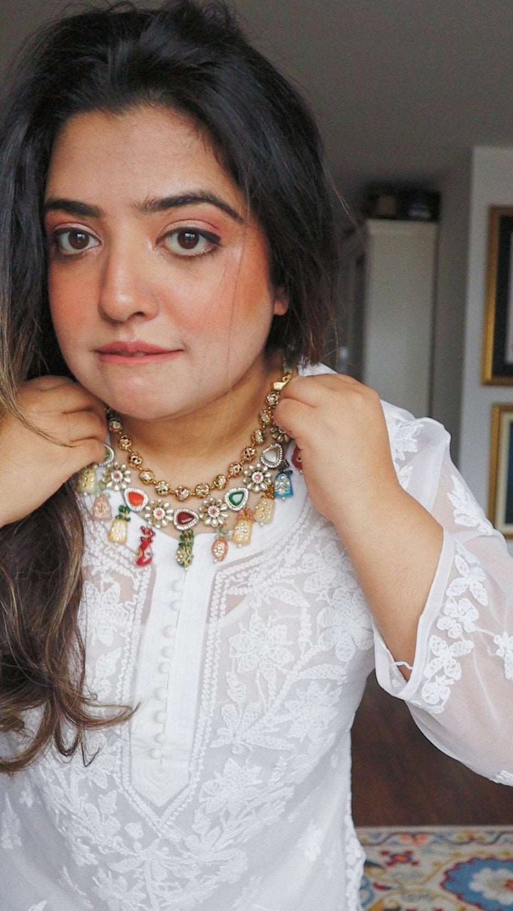 Meera Haar (with earrings)